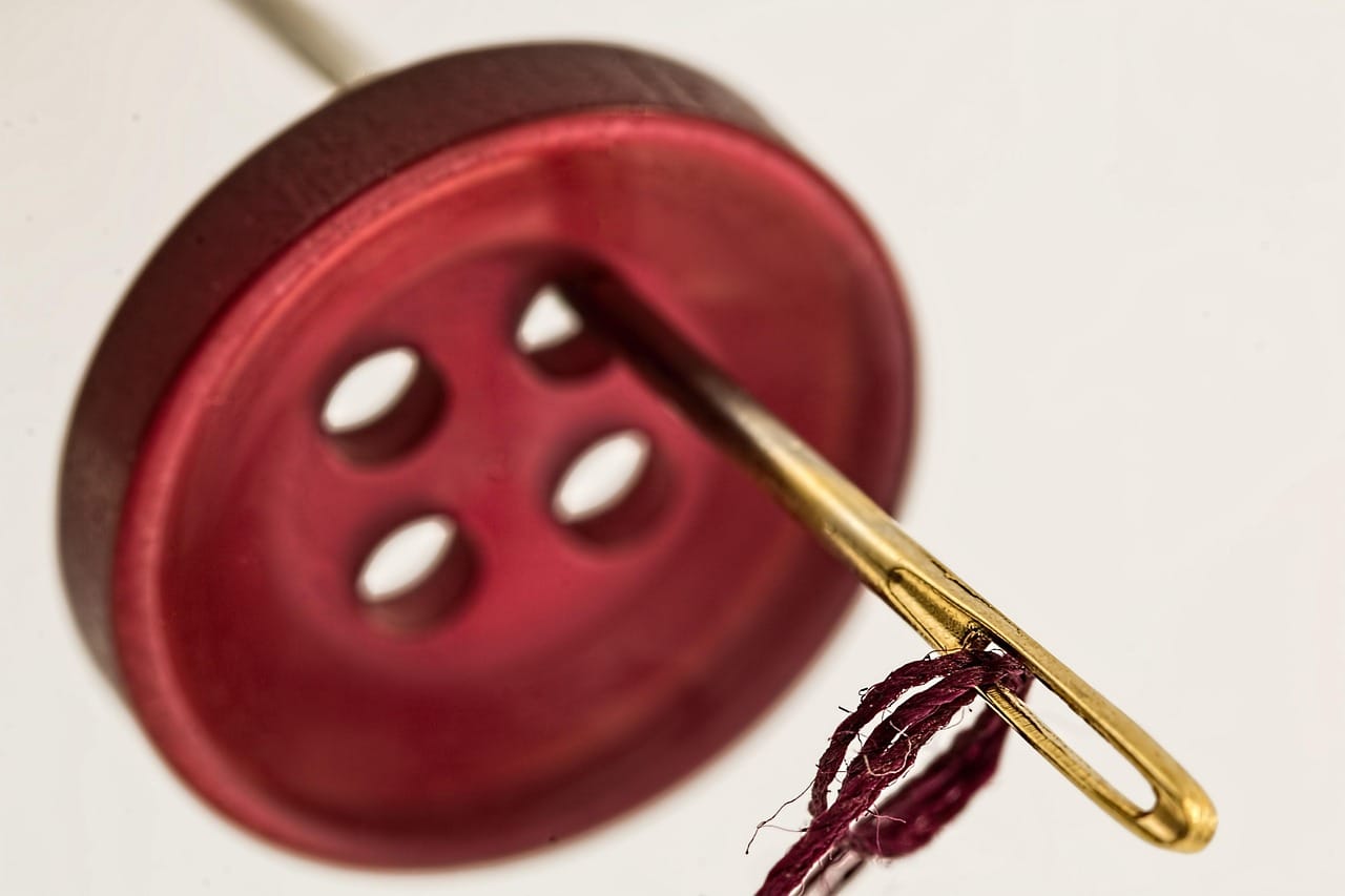 Each button is cut, drilled and polished by hand. A simple one takes forty minutes.