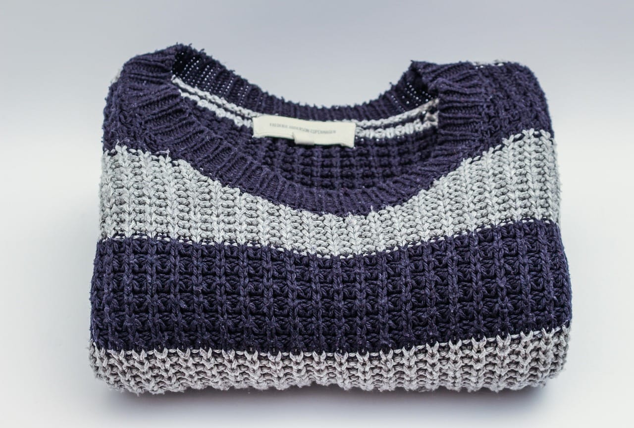 Knitwear does the most work in a capsule. Buy the best you can afford.
