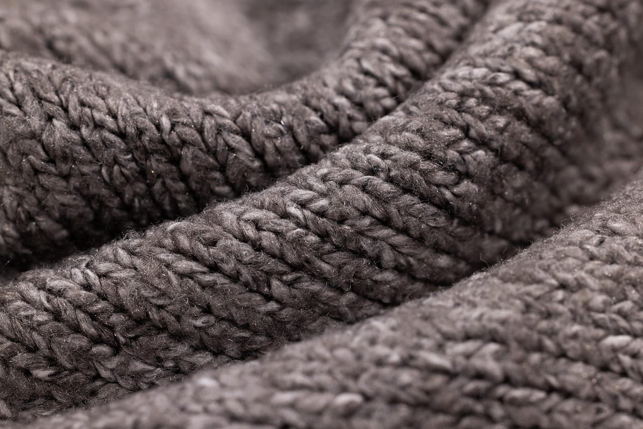 Double-faced wool needs no lining. Look at the inside of the hem: a clean, hand-finished edge is a good sign.
