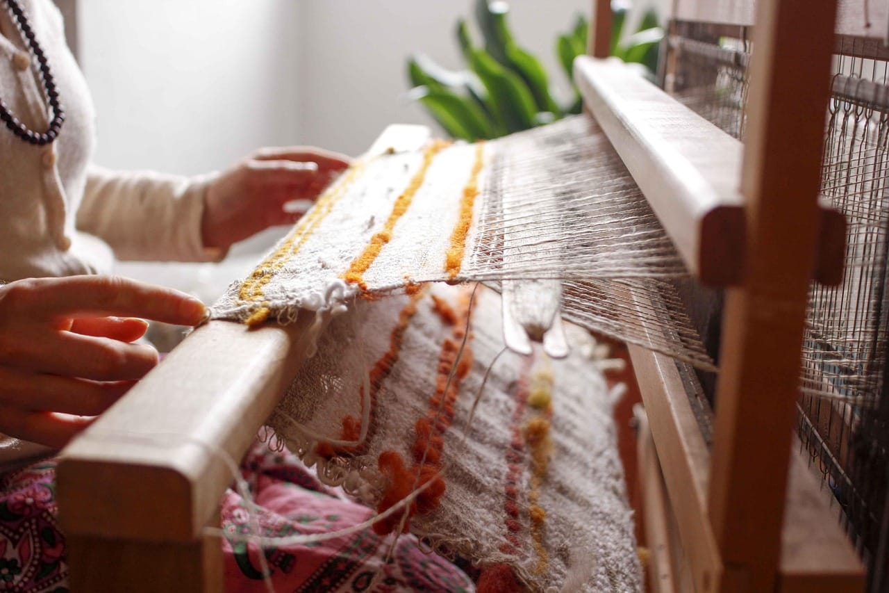 A shuttle loom from the 1950s weaves one metre of denim in the time a modern loom weaves six.
