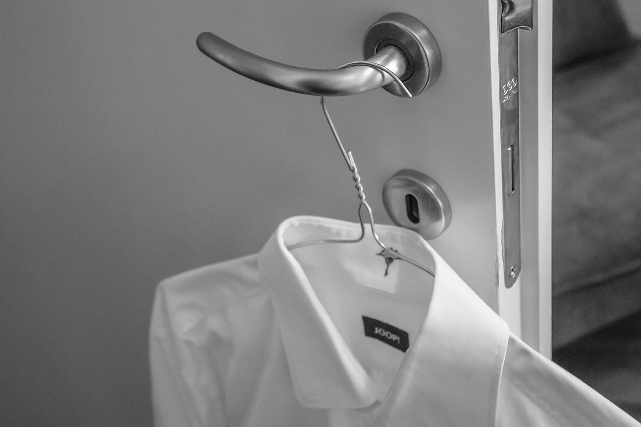 Cotton poplin, a soft collar and a hem long enough to stay tucked in.